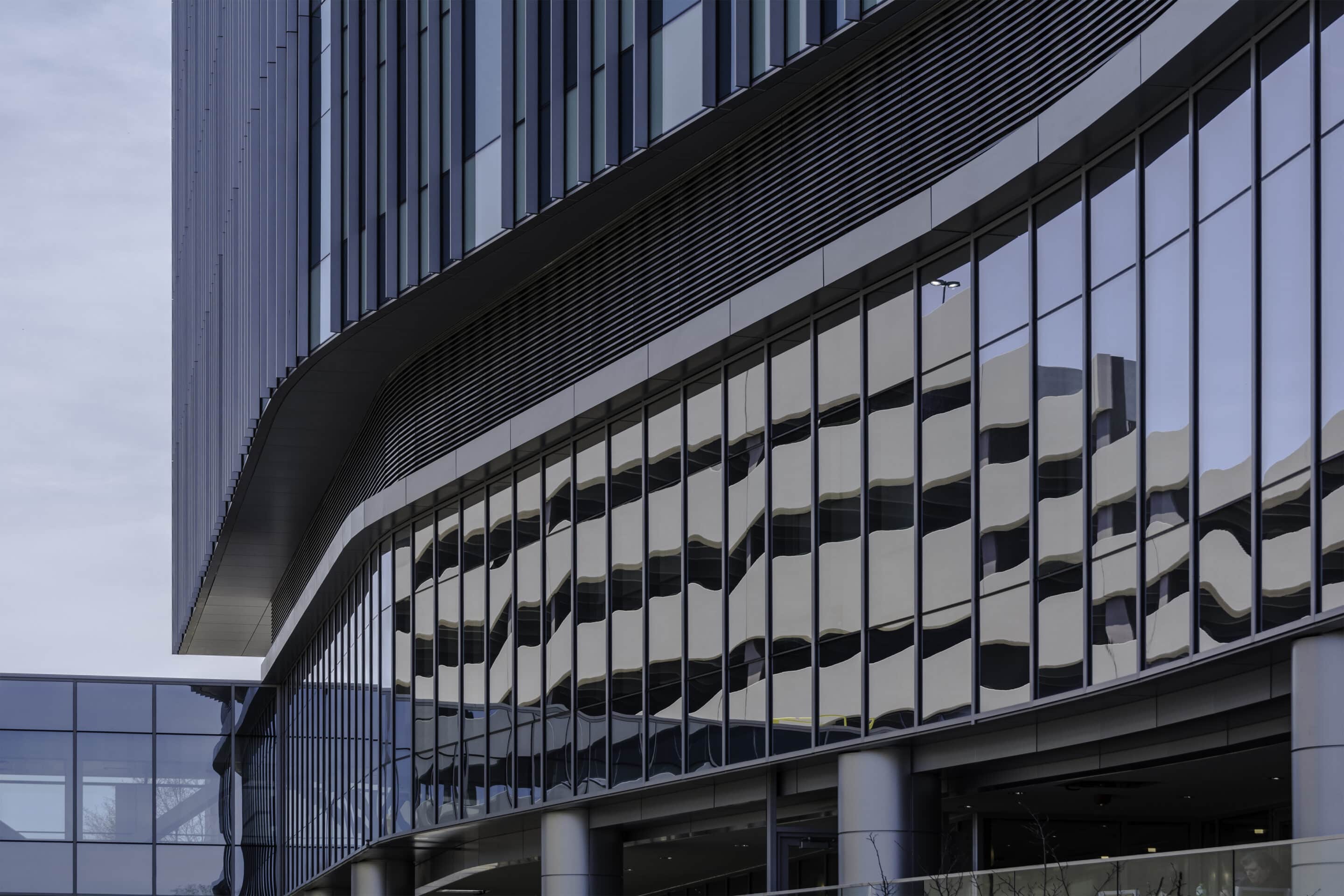 Image of an Americlad building on a sunny day that displays louvers and a louver systems.