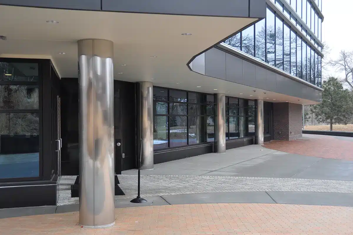 Exterior view of building with reflective column covers